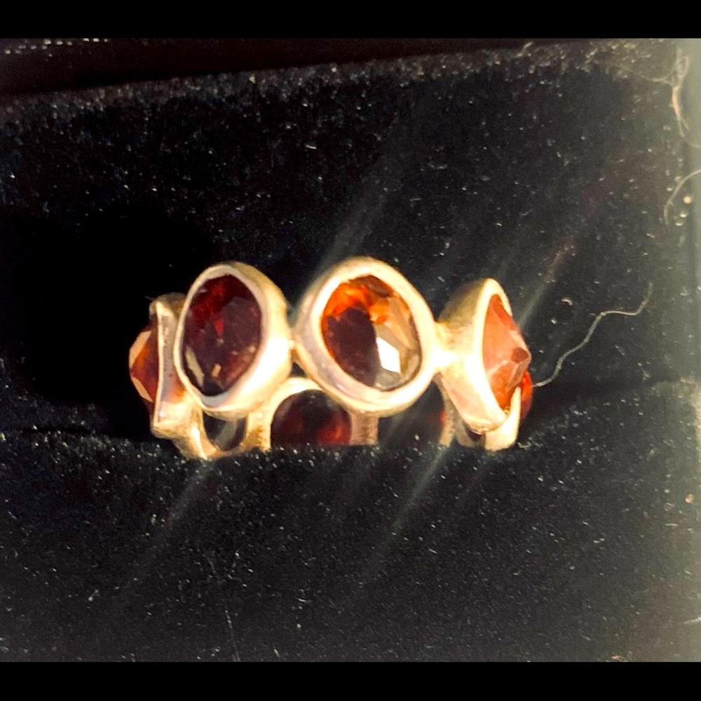 Garnet and silver infinity ring